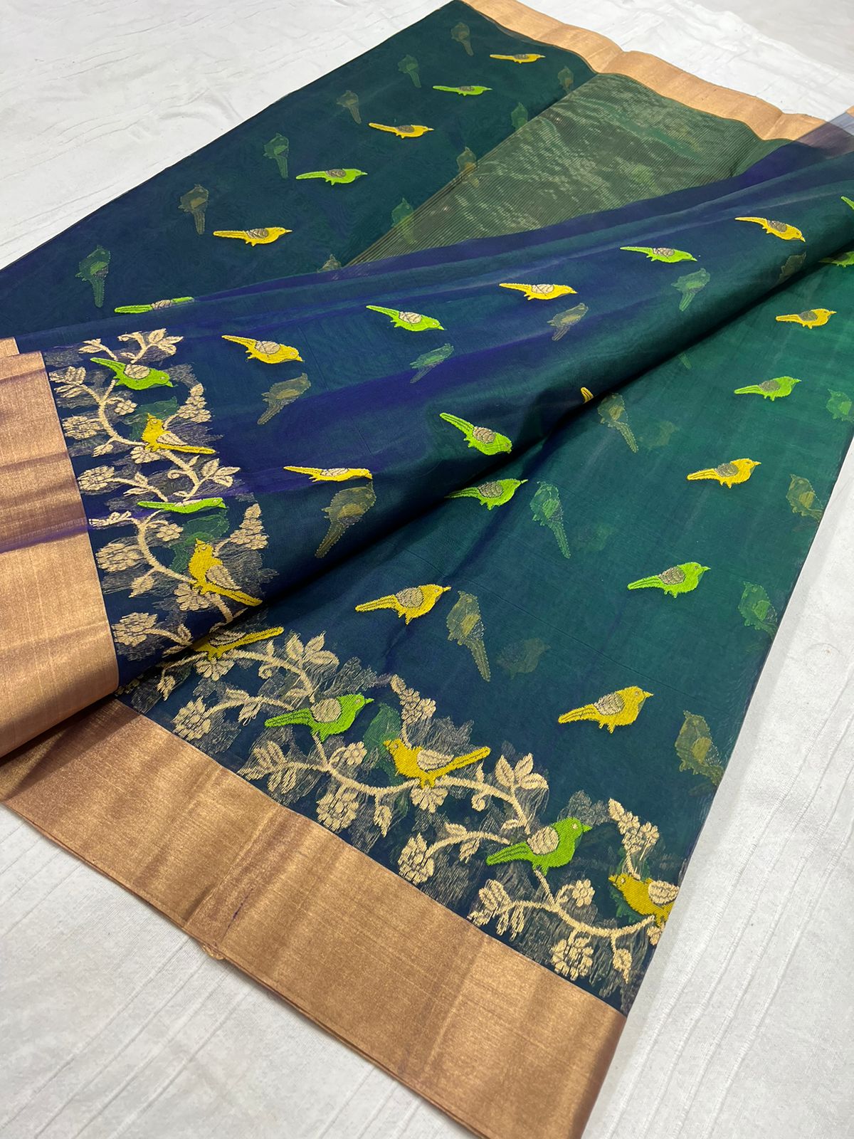 Elegant Peacock Green Silk Saree with Golden Detailing