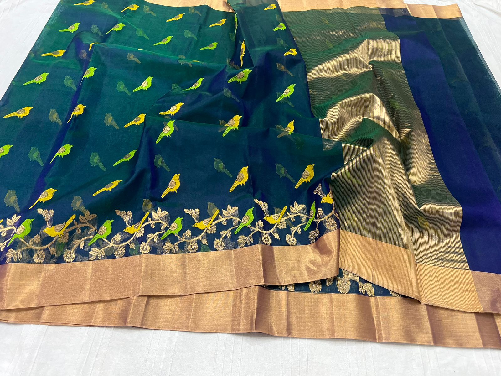 Elegant Peacock Green Silk Saree with Golden Detailing