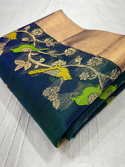 Elegant Peacock Green Silk Saree with Golden Detailing