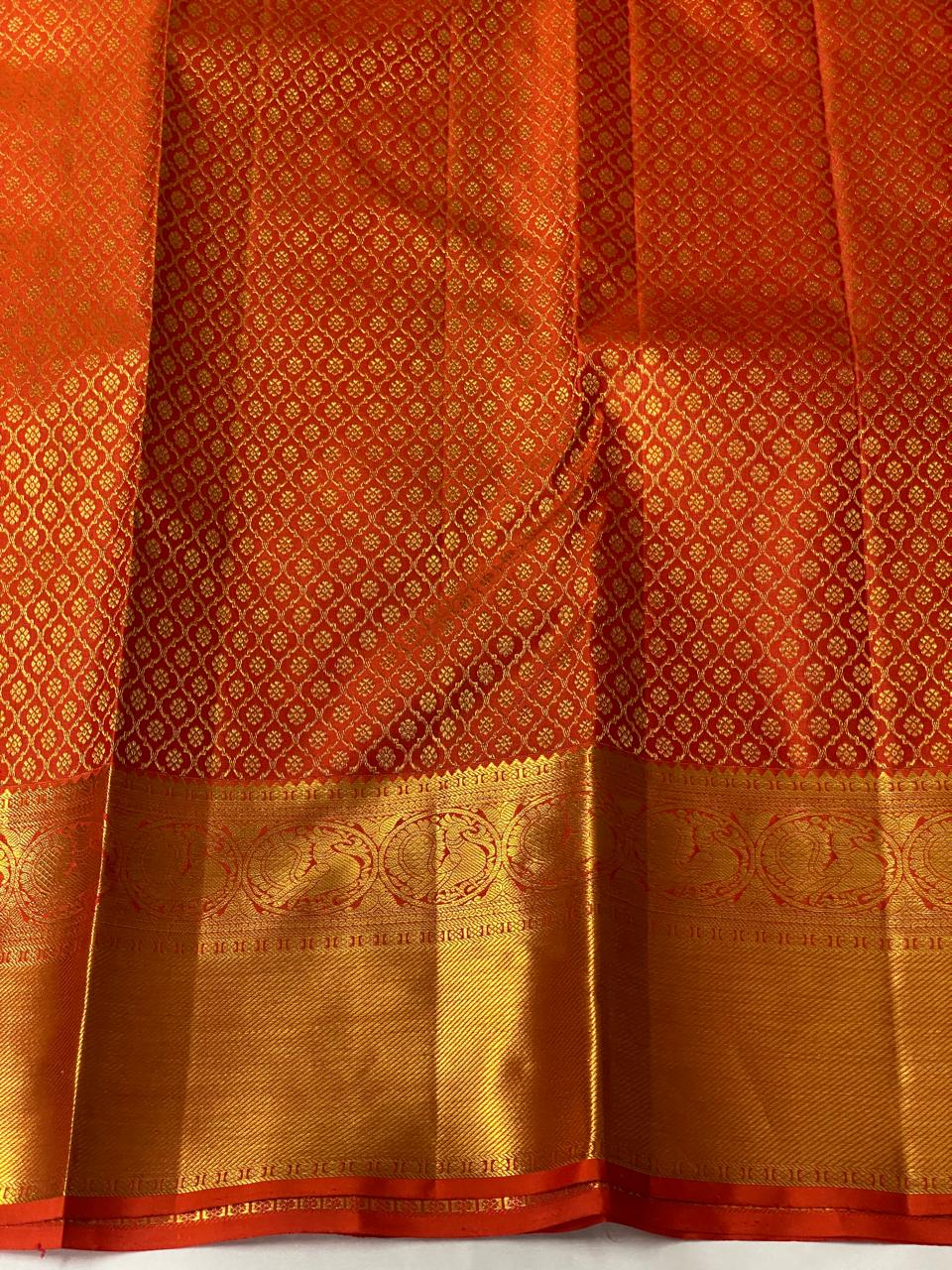 BOTTLE GREEN / ORANGISH RED KANCHI SILK SAREE