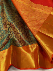 BOTTLE GREEN / ORANGISH RED KANCHI SILK SAREE