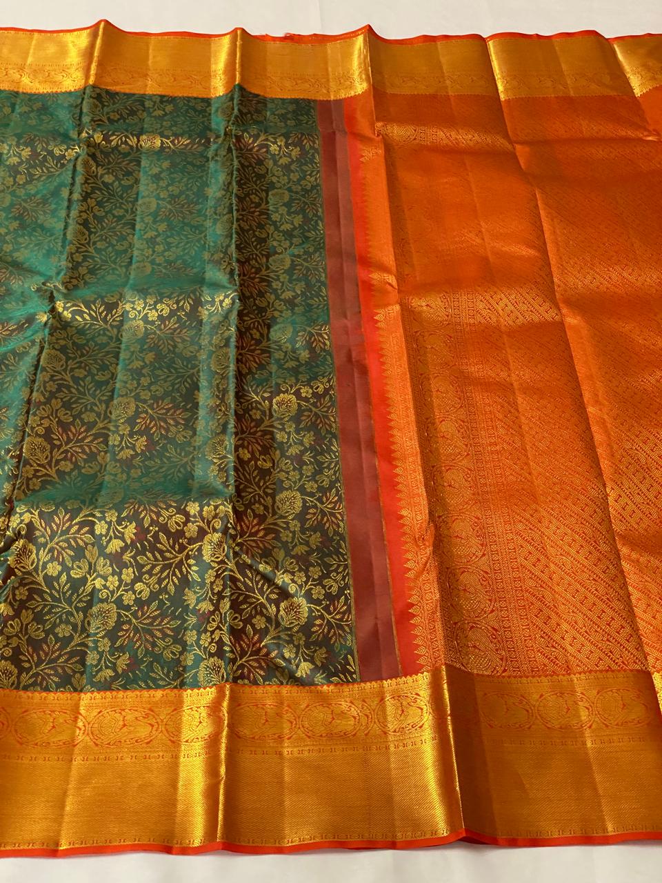 BOTTLE GREEN / ORANGISH RED KANCHI SILK SAREE