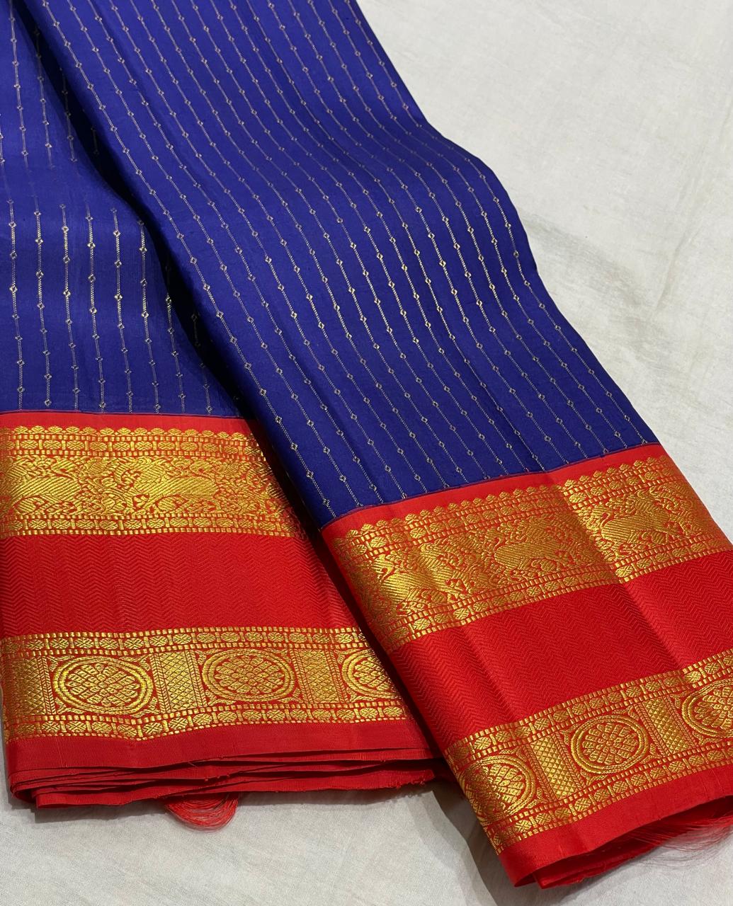 NAVY BLUE/ORANGISH RED  BORDER COLOUR COMBITION PURE KANCHI SILK SAREE