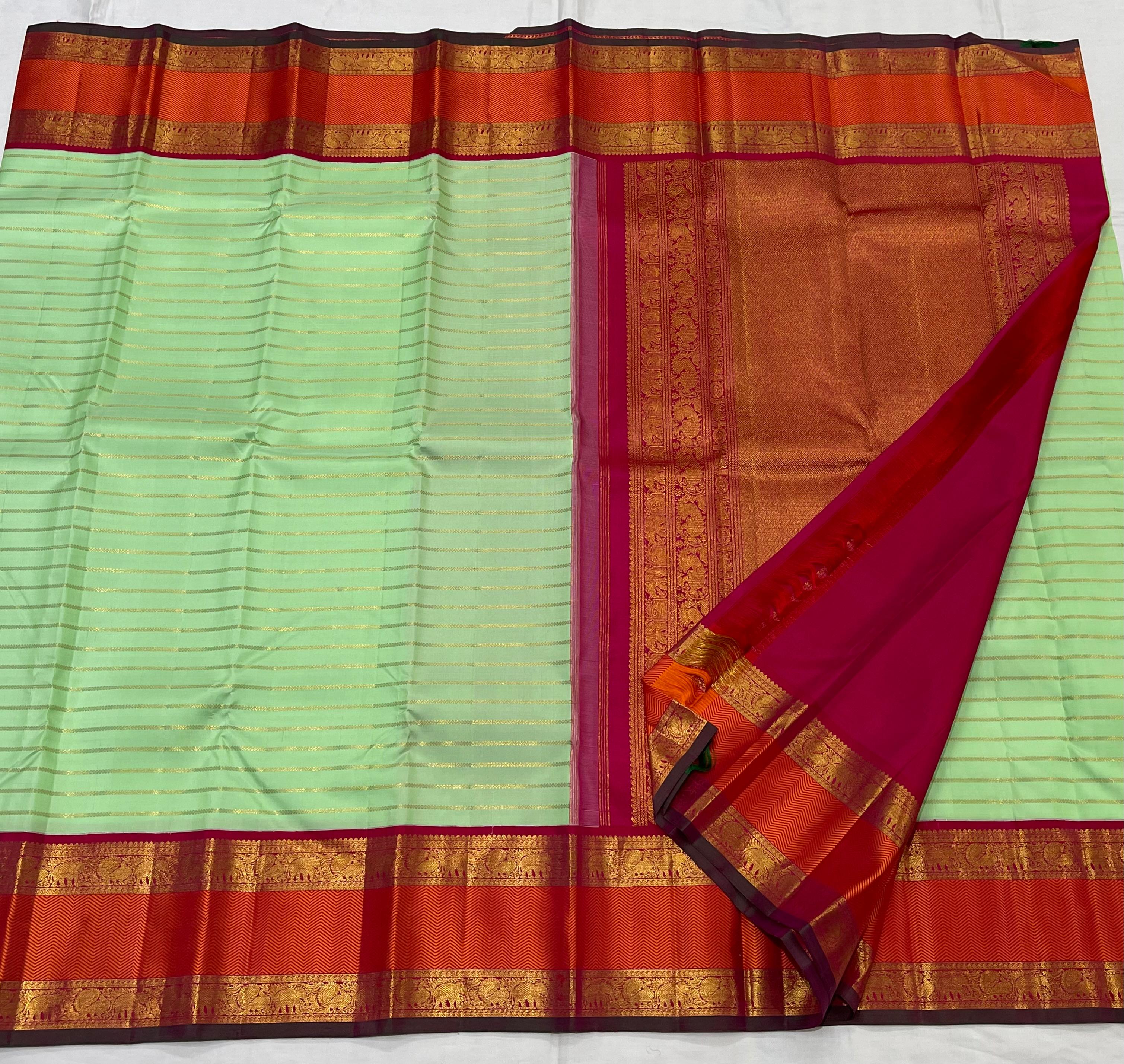 PISTA GREEN/ORANGISH RED  BORDER COMBITION PURE KANCHI SILK SAREE