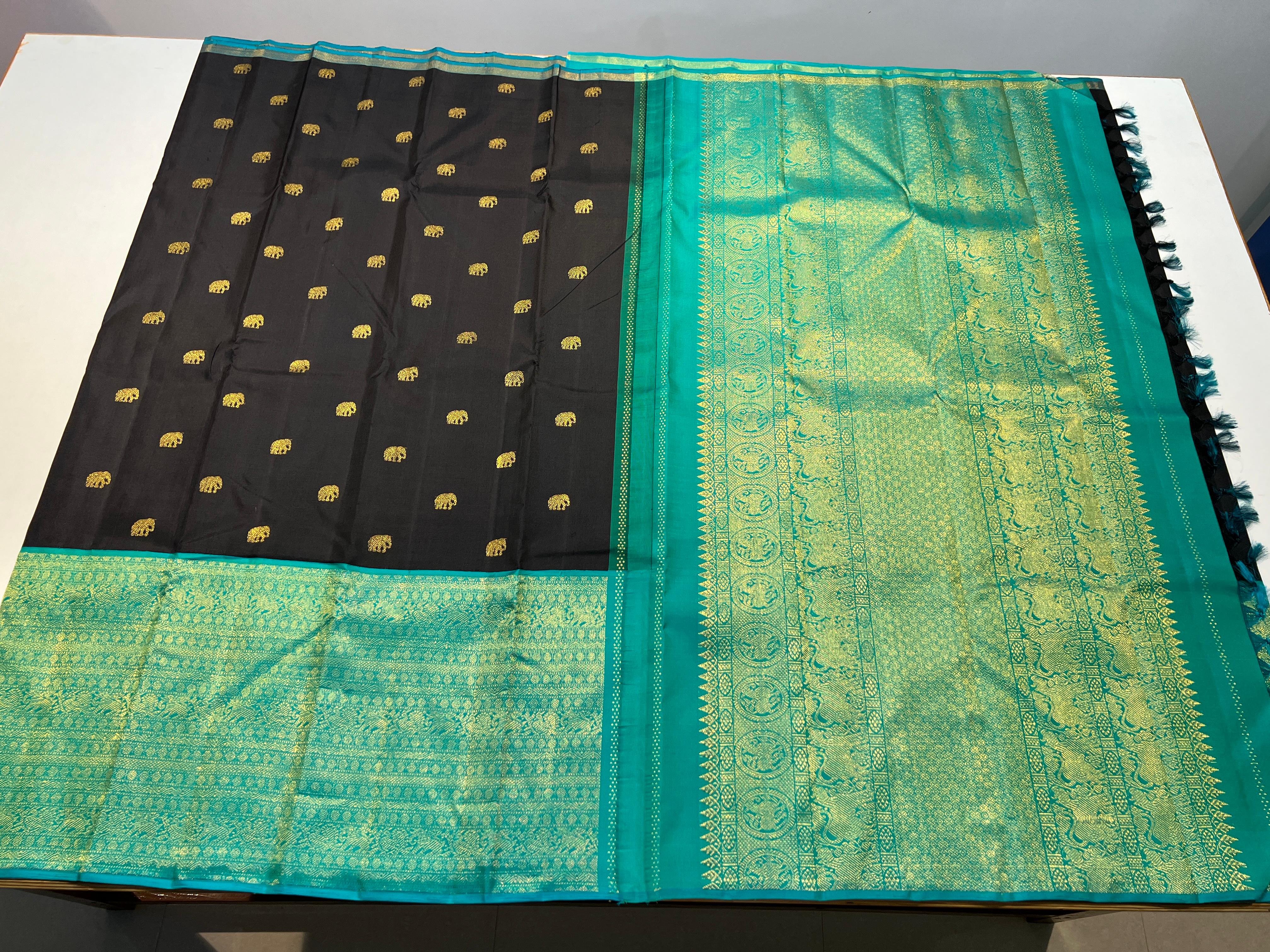 BLACK/TURQUISE GREEN COLOUR  ZARI BORDER COMBITION PURE KANCHI SILK SAREE