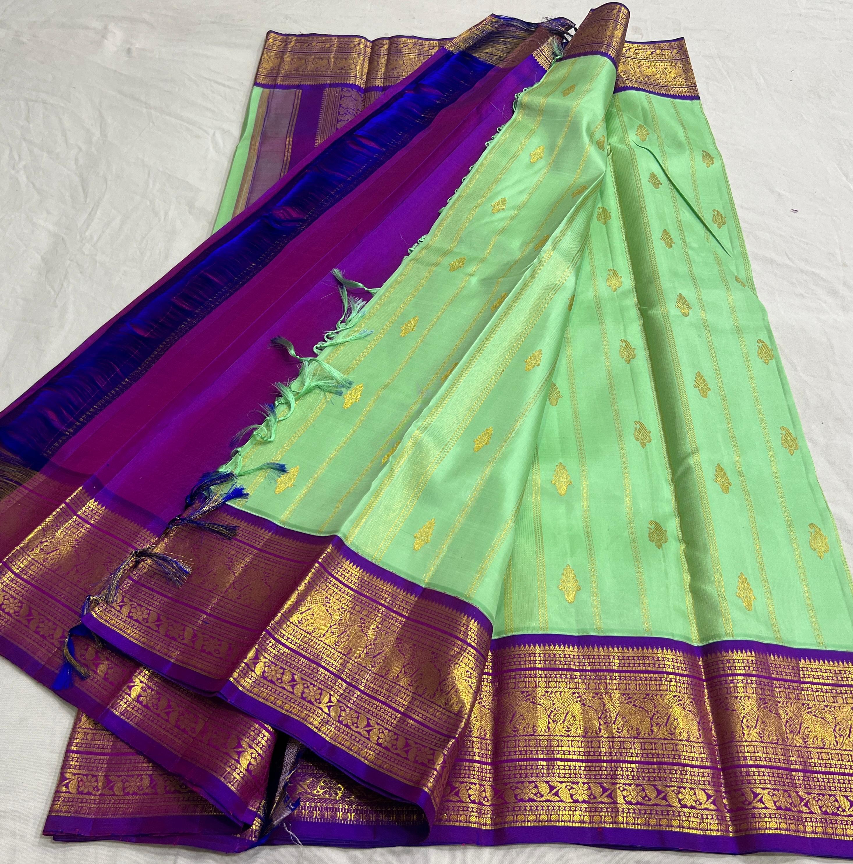 LITE PISTA GREEN/PURPLE COLOUR ZARI COMBINITION PURE SILK SAREES