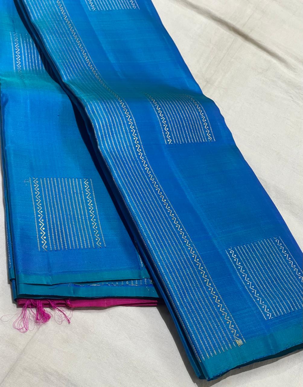 PARROT GREEN/ RED BOARDERLESS KANCHI SAREE